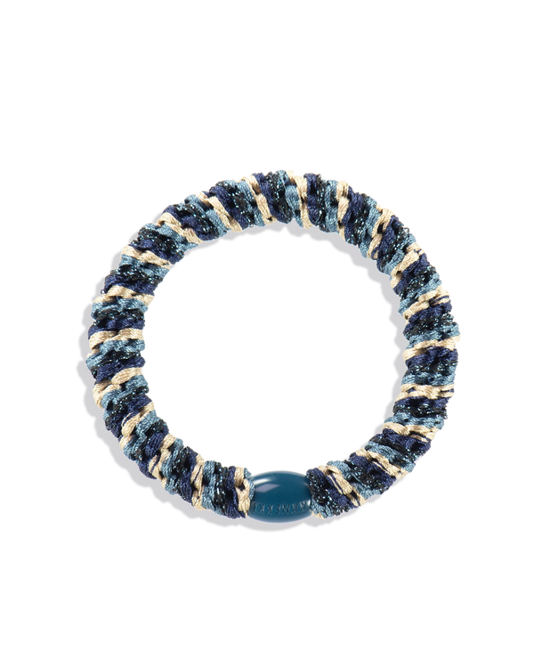 Goma de pelo Kknekki